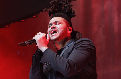 LOS ANGELES, CA - FEBRUARY 07: Recording artist Abel Tesfaye of The Weeknd performs onstage at Lucian Grainge's 2015 Artist Showcase Presented by American Airlines and Citi on February 7, 2015 in Los Angeles, California. (Photo by Rachel Murray/WireImage)